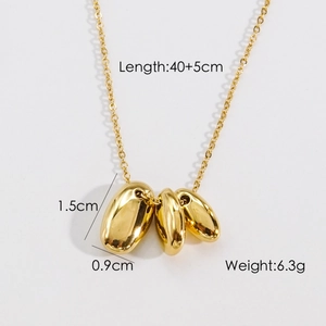 Macro detail of polished gold-plated stainless steel triple pebble pendant with dimensions