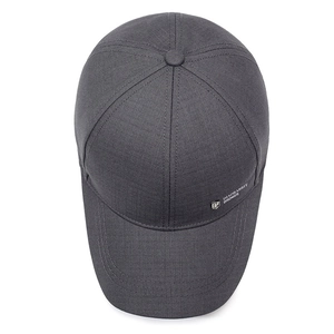 Deep grey casual baseball cap with side text embroidery and metal shield logo