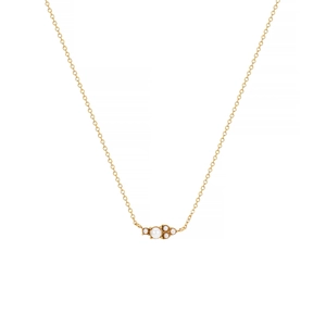 Detailed close-up of 18k gold-plated necklace featuring a cluster of white pearls