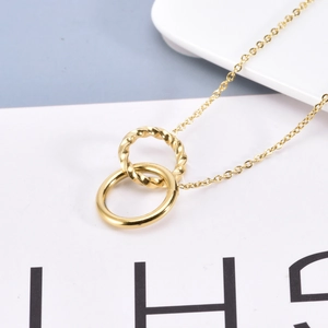 Minimalist double interlocking ring necklace in gold finish with rope texture chain