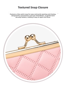 Macro detail of a pink quilted mini wallet featuring a classic gold kiss-lock closure