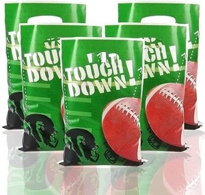 Detail of green American football party gift bags featuring Touch Down text and helmet