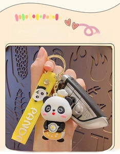 Detailed view of creative panda keychain with chef panda pendant and yellow wrist strap