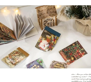 Detailed close-up of retro Christmas stickers with gold foil and festive winter motifs