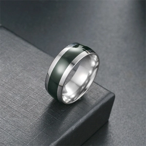 Minimalist titanium steel band ring featuring a deep green enamel inlay for daily wear