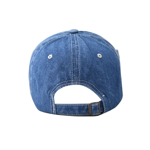 Detail view of the washed denim baseball cap back with adjustable metal buckle and stitching