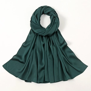 Deep green faux silk hijab scarf with premium satin gloss and elegant draped texture