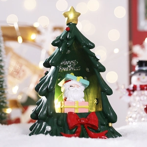 LED lighted resin Christmas tree with Santa and red bow holiday home decoration