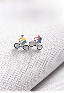 Detail of TPR latex backing on white bath mat showing non-slip triangular grid texture