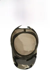Internal view of camouflage army cap showing stitching and metal adjustable buckle