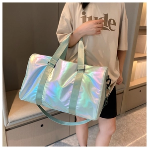 Light green gradient travel bag with detachable shoulder strap and holographic finish