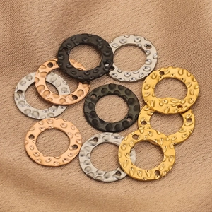 Textured stainless steel round connectors in gold, silver, rose gold, and black for DIY jewelry