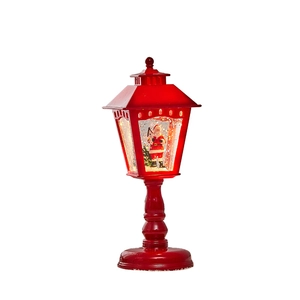 Vintage red Christmas lantern lamp with Santa Claus figure and warm LED lighting decoration