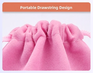 Detail of pink velvet jewelry pouch showing soft texture and drawstring closure system