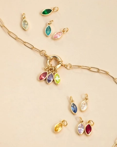 Detail of 18K gold plated necklace with colorful teardrop zircon birthstone pendants
