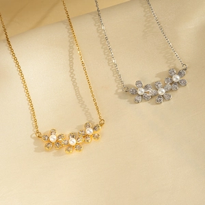 Elegant gold and silver titanium flower necklaces with zircon petals and pearl centers