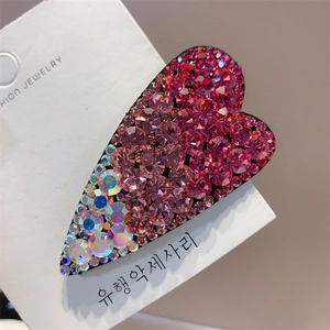 Sparkling pink rhinestone heart-shaped BB hair clip on jewelry card display