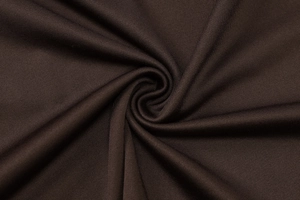 Détail macro d'un tissu en maille marron foncé de haute qualité avec une texture douce
