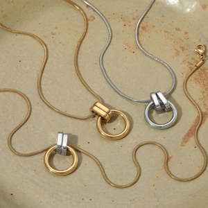 Minimalist stainless steel snake chain necklaces with geometric circle pendants in gold and silver