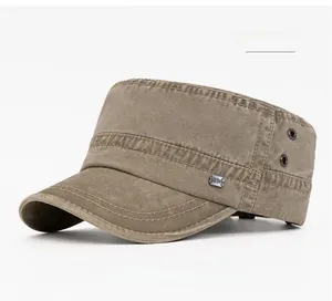 Detail of khaki cotton cadet cap showing metal NEW tag and breathable side eyelets