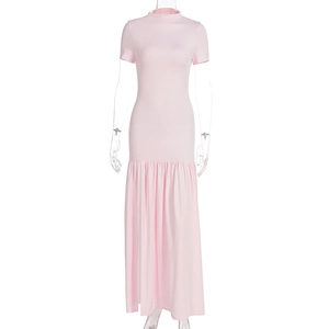 Detail of light pink slim fit maxi dress with short sleeves and ruffled hem design
