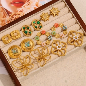 French vintage 18K gold plated stainless steel floral earrings collection display