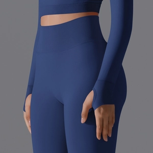 Close-up of seamless ribbed yoga pants with high waist and thumb hole sleeve detail