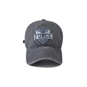 Detail view of vintage washed grey cotton baseball cap with FORCE embroidery patch