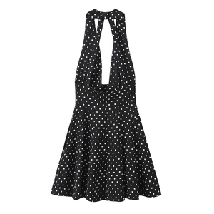 Robe dos nu chic à pois noirs et blancs avec une silhouette trapèze rétro élégante