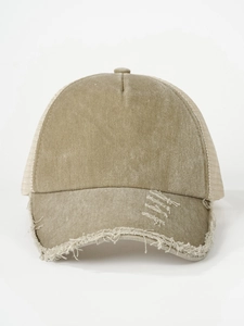 Detailed close-up of khaki washed mesh trucker hat with vintage frayed edges and breathable net