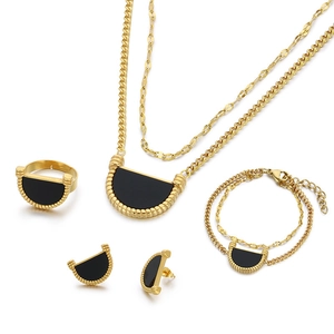 Four-piece gold titanium steel jewelry set with black semi-circular acrylic insets