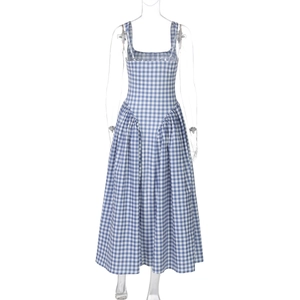 Detailed view of the blue and white plaid dress with square neck and pleated waistline