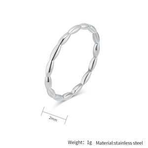Detailed view of 2mm silver stainless steel beaded ring with tiered teardrop design