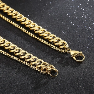 Close-up of gold double-layer Cuban and box chain bracelet with secure lobster clasp