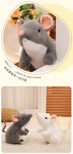 Close-up of grey and white realistic plush mice toys with soft fur and pink ears