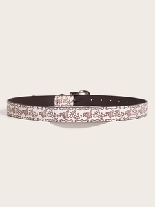 Detail of white belt featuring brown butterfly print and shiny silver buckle