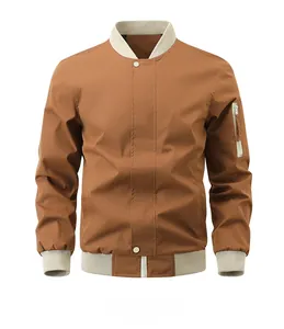 Detail of brown bomber jacket with ribbed collar and utility sleeve pocket