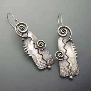 Boucles d'oreilles pendantes tribales rétro avec spirale géométrique pour femme
