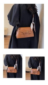 Detail of a brown leather crossbody bag featuring a silk scarf with heart prints and gold buckle