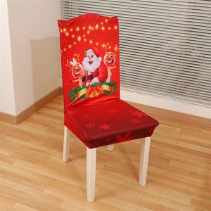 Detail der roten Weihnachts-Stuhlhusse mit Cartoon-Weihnachtsmann- und Elchmustern