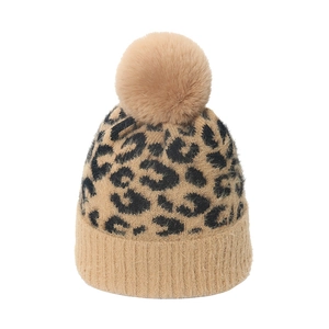 Bonnet en tricot léopard pour femme avec pompon en fausse fourrure et revers côtelé chaud