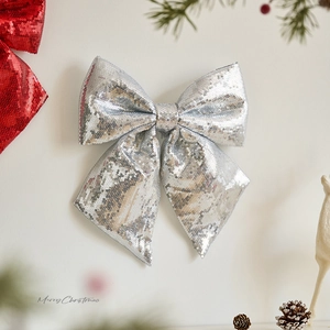 Sparkling silver sequin Christmas bow pendant for festive holiday window decoration