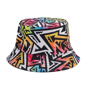 Reversible bucket hat featuring vibrant graffiti print and colorful geometric shapes