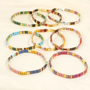 8-piece set of colorful Tila bead bracelets with bohemian enamel tile and gold accents
