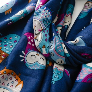 Detailed view of colorful cartoon owl print on soft cotton linen fabric scarf