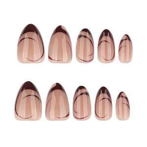 French almond press-on nails with burgundy swirls and nude base on white background