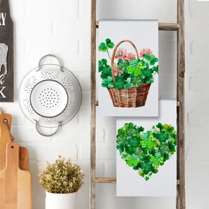 Microfiber kitchen towels with watercolor basket and clover heart on a wooden ladder