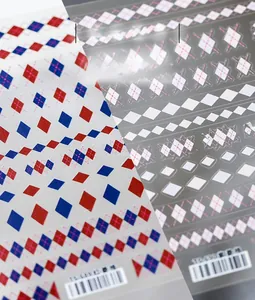 Detail of red and blue diamond pattern nail stickers with self-adhesive backing TS-639