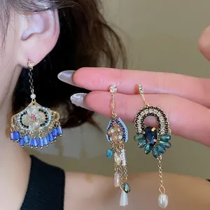 Boucles d'oreilles vintage avec perles et pompons en cristal de style ethnique chic