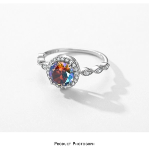 Detailed macro view of S925 sterling silver ring featuring a round rainbow gemstone